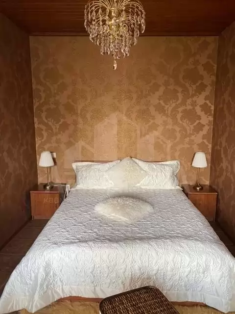 100875
